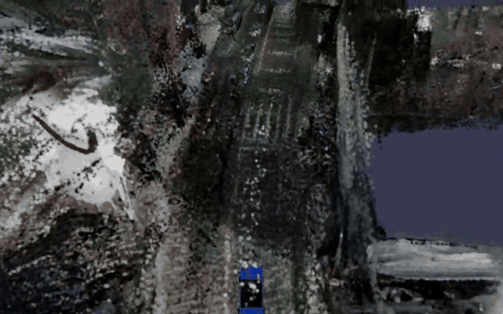 A top-down chase camera follows the recorded trajectory down a Boston street rendered entirely as 3D Gaussian splats - road markings, crosswalks, parked cars, and curbside foliage - with no map underneath, just the reconstruction.