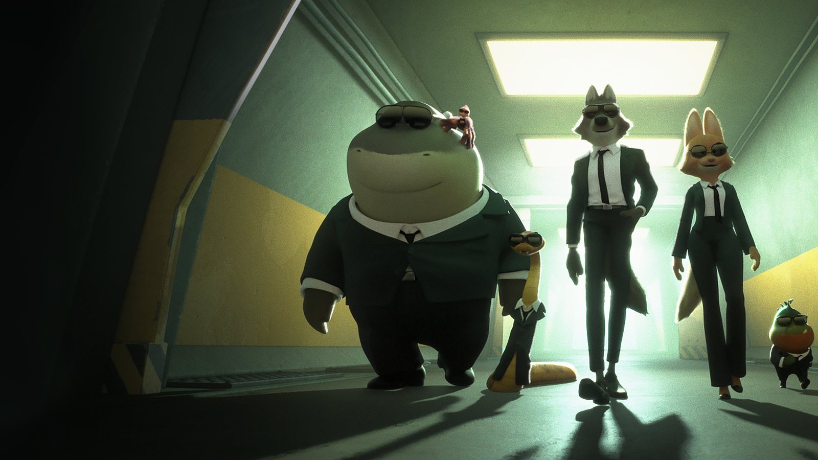 The Bad Guys 2 - the crew in suits walking down a lit corridor. Scene still © DreamWorks Animation / Universal Pictures