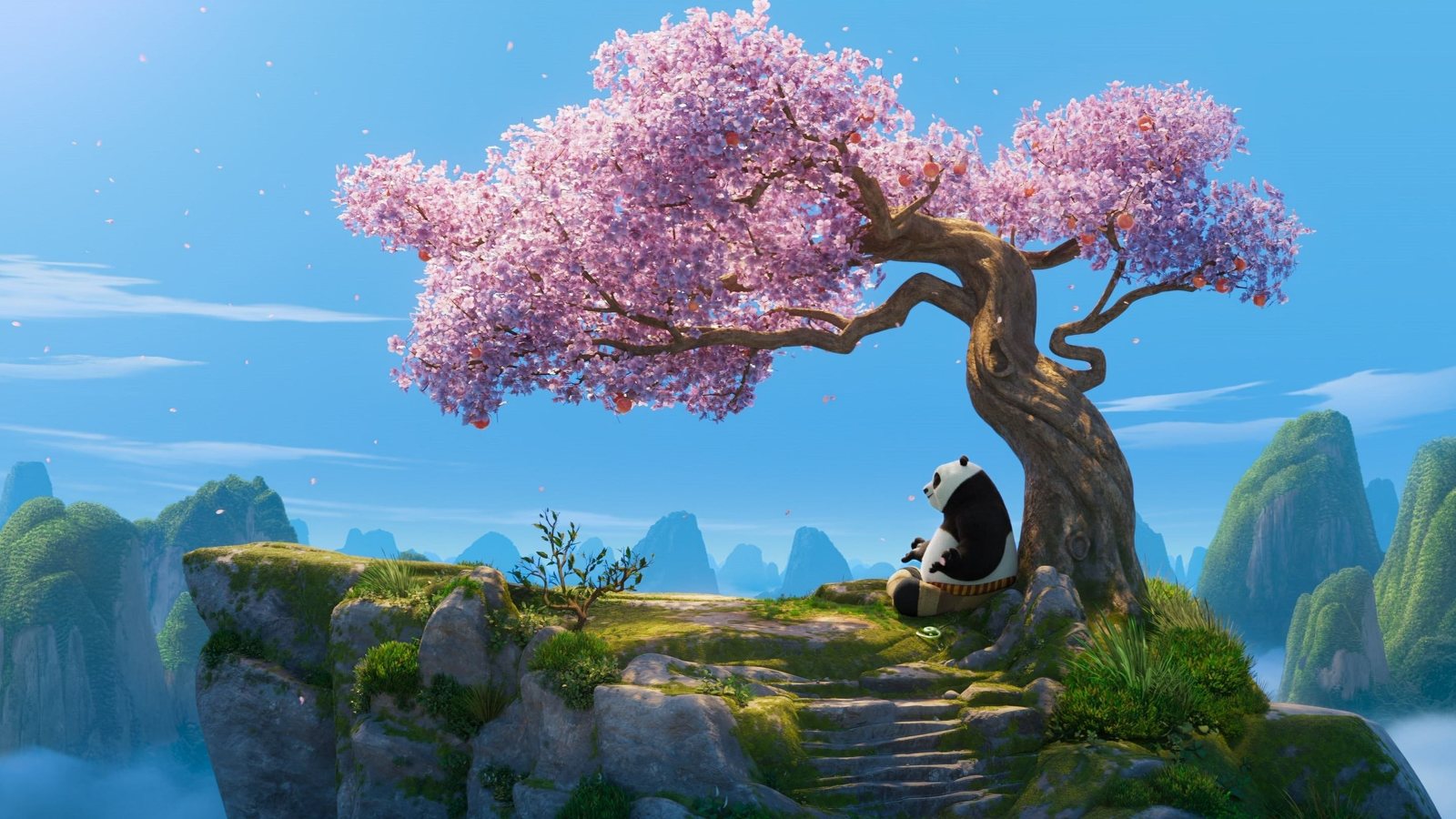 Kung Fu Panda 4 - Po meditating beneath a cherry-blossom tree on a cliff. Scene still © DreamWorks Animation / Universal Pictures